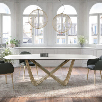 Distinguished Tonin Casa Tenso table crafted with a sculptural interwoven base in polished golden tone steel and light beige ceramic tabletop