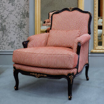 Luxury Bellotti Ezio lounge chair with striking red and white stripes, lacquered frame in brushed yellow‑black tempera, seat