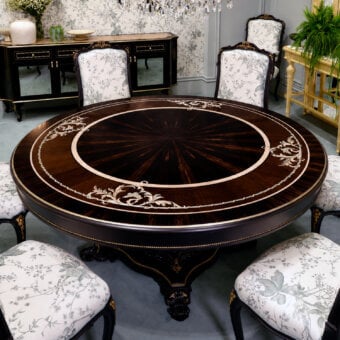 Luxury Bellotti Ezio dining table in LAN1 black lacquered tempera with aged gold accents, birch stringing, mother‑of‑pearl leaf inlays and concentric‑circle design