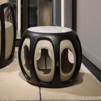 Luxury Giorgetti Yuan side table with ash frame textured grain, marble top, cream leather interior, white stone surface