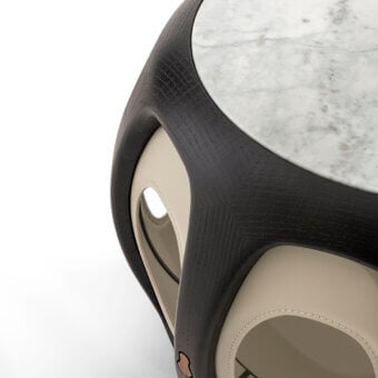 Luxury Giorgetti Yuan side table with polished white marble top, dark ashwood base in matte textured finish and fixed‑finish cream leather interior stitching