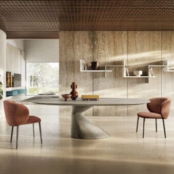 Sophisticated Lago Chapeau oval table in light grey matte finish with cantilevered top and sculptural asymmetrical base