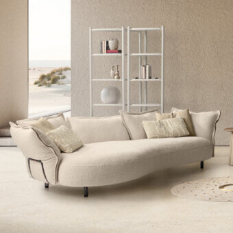 Luxury Nuvola sofa upholstered in textured textile beige-cream tone with metal legs finished in warm natural colors