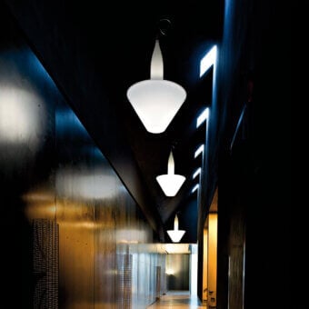 Elegant Serralunga Bonheur lamp crafted in white LLDPE with a smooth, textured finish and gray metal frame