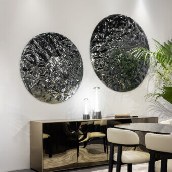 Distinguished Tonin Casa Gong wall art piece with silvery-grey and deep shadowed tones and high-gloss textured finish