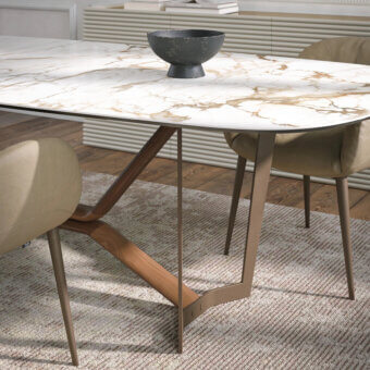 Exceptional Tonin Casa Oliver table with light ceramic and warm wood, built with a muted bronze metal base