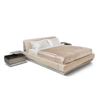 Elegant Visionnaire Prelude Bed with polished marble base, upholstered cream bouclé headboard, and satin champagne duvet