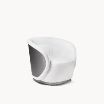 Luxury Visionnaire Shell Lounge Chair with pristine white fabric, satin stainless‑steel rear panel, and swivel steel base