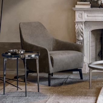 Prestige Alivar Celine lounge chair upholstered with premium fabric muted taupe matte finish and tapered dark legs
