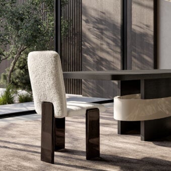 Prestige Costantini Pietro Academy armchair upholstered in off‑white bouclé with glossy dark beechwood base