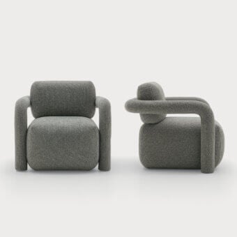Luxury Ditre Italia Hairpin Lounge chair in textured heathered medium‑grey fabric with smooth rounded seat and back surrounded by thick tubular armrests extending to floor