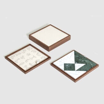 Premium Pinetti Tangram Box with walnut wood frame, satin‑matte grain, white linen lining, and marble triangles squares parallelograms