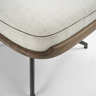 Luxury Porada Cuna lounge pouf with walnut shell, off‑white cushion, dark‑metal legs, frame, natural matte finish