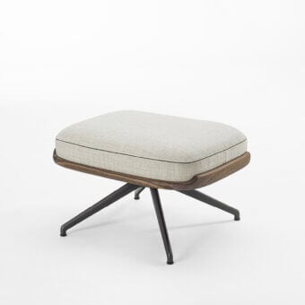 Contemporary Porada Cuna Lounge pouf with solid walnut shell, light‑grey upholstered cushion, and matte black metal legs