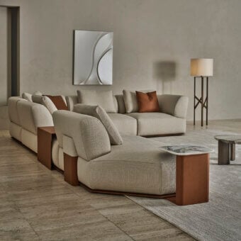 Exquisite Rugiano Hatton sectional with low-profile modular silhouette in textured greige textile, matte brown leather and white marble