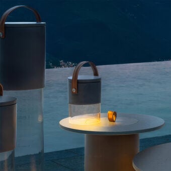 Luxury Talenti Kukà Table Lamp with clear methacrylate base, grey matte housing, brown leather‑like handle, lower section