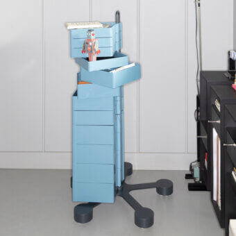 Sophisticated B-Line Spinny drawer storage unit in light blue ABS plastic and dark gray painted steel with swivel casters