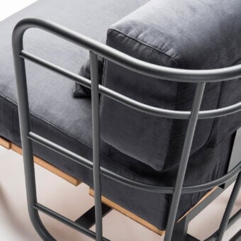 Sophisticated Chairs & More Jujube Divani sofa with matte charcoal tubular metal shell and dark grey outdoor fabric