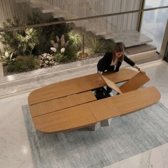 Refined Ozzio Italia Optimus extendable table with rich medium brown wood top and sculptural light grey metal base