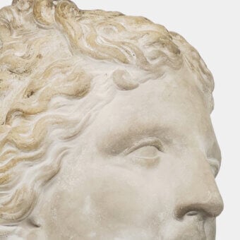 Fine Vèlle Milano Aphrodite sculpture in cream aged effect plaster with brownish gold accents and leather wrapped steel base