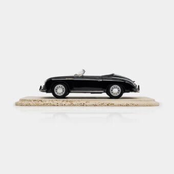 Exquisite Vèlle Milano Porsche 356 A Speedster model in glossy black metal with refined beige interiors and marble base
