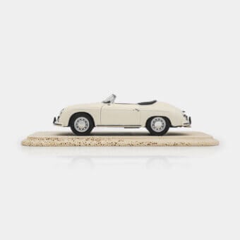 Exquisite Vèlle Milano Porsche 356 A Speedster model in high-gloss ivory metal with deep black interior and silver accents