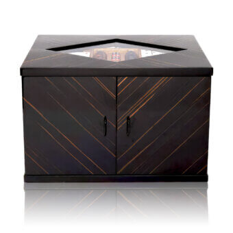 Sophisticated Agresti game chest in wood with glossy dark brown finish and amber chevron patterns
