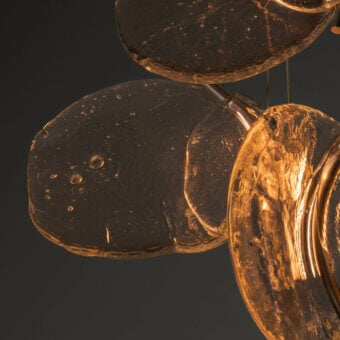 Sophisticated Bocci 141 Cluster Suspension Lamp in glossy amber golden translucent seeded glass with asymmetrical lines