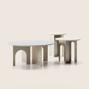 Luxury Paolo Castelli coffee table featuring cross shaped base in champagne satin finished metal and natural ivory polished stone top