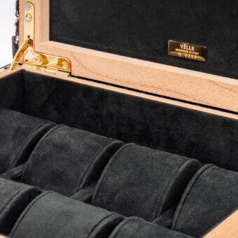 Sophisticated Vèlle Milano watch case in smooth natural wood finish with microfiber interior and gold-toned metal hardware