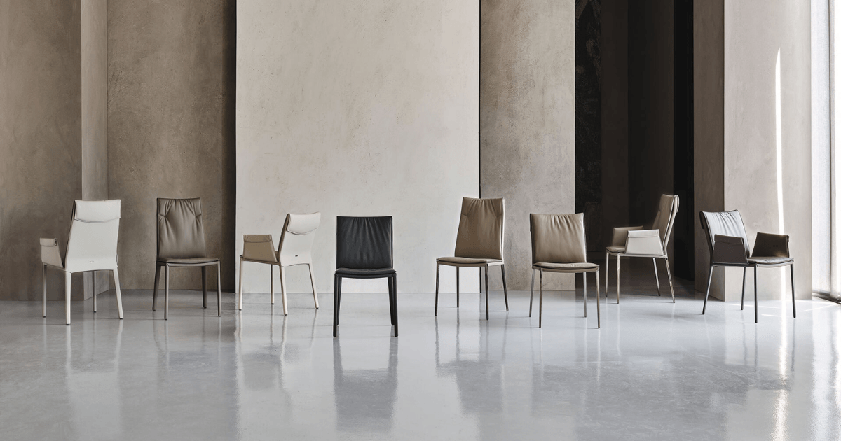 Armrests and backrest height change the space a chair occupies and its presence around the table.