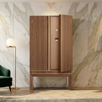 Exquisite Agresti armoire featuring wooden exterior vertical grain 24 karat gold hardware mid tone brown finish safe door