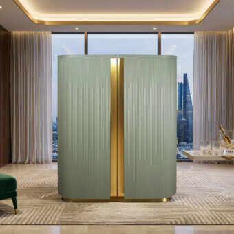 Sophisticated Agresti Peninsula bar cabinet in sage green wood, marble, polished brass, and mirrored glass