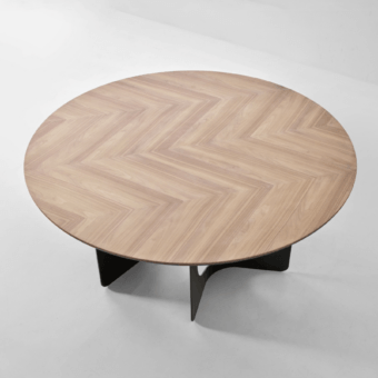 Elegant Modesign Hole table with circular light brown wood chevron tabletop in matte finish and dark curved panels