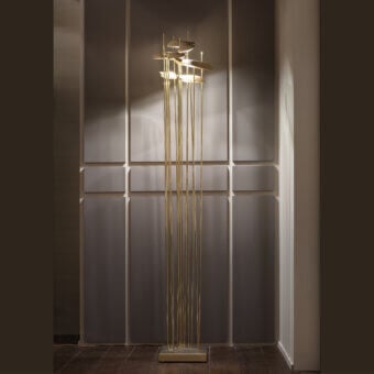 Sophisticated Paolo Castelli Anodine floor lamp in golden-yellow brass with satin matt gold finish and asymmetrical leaves