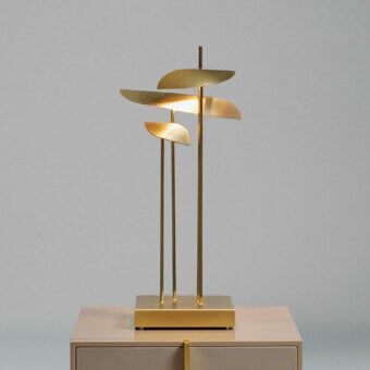 Exquisite handcrafted Paolo Castelli Anodine table lamp featuring brass stems, base, and leaf shaped metal elements