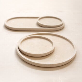 Sophisticated Pimar Messapo decorative trays featuring natural stone with matte textured finish