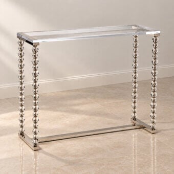 Elegant Selezioni Domus Pianeti Transparenti console with clear spherical elements and polished metal H-shaped base