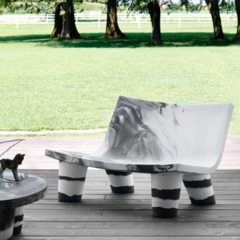 Exquisite Slide Low Lita Love sofa in white polyethylene featuring matte finish and abstract black marble pattern