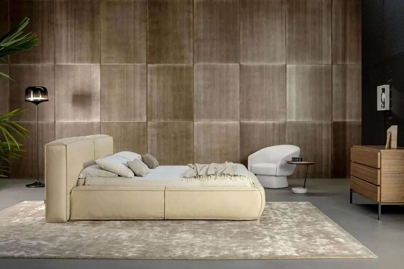 Lavish Bonaldo Fluff bed with rounded silhouette upholstered in beige textile featuring a matte finish