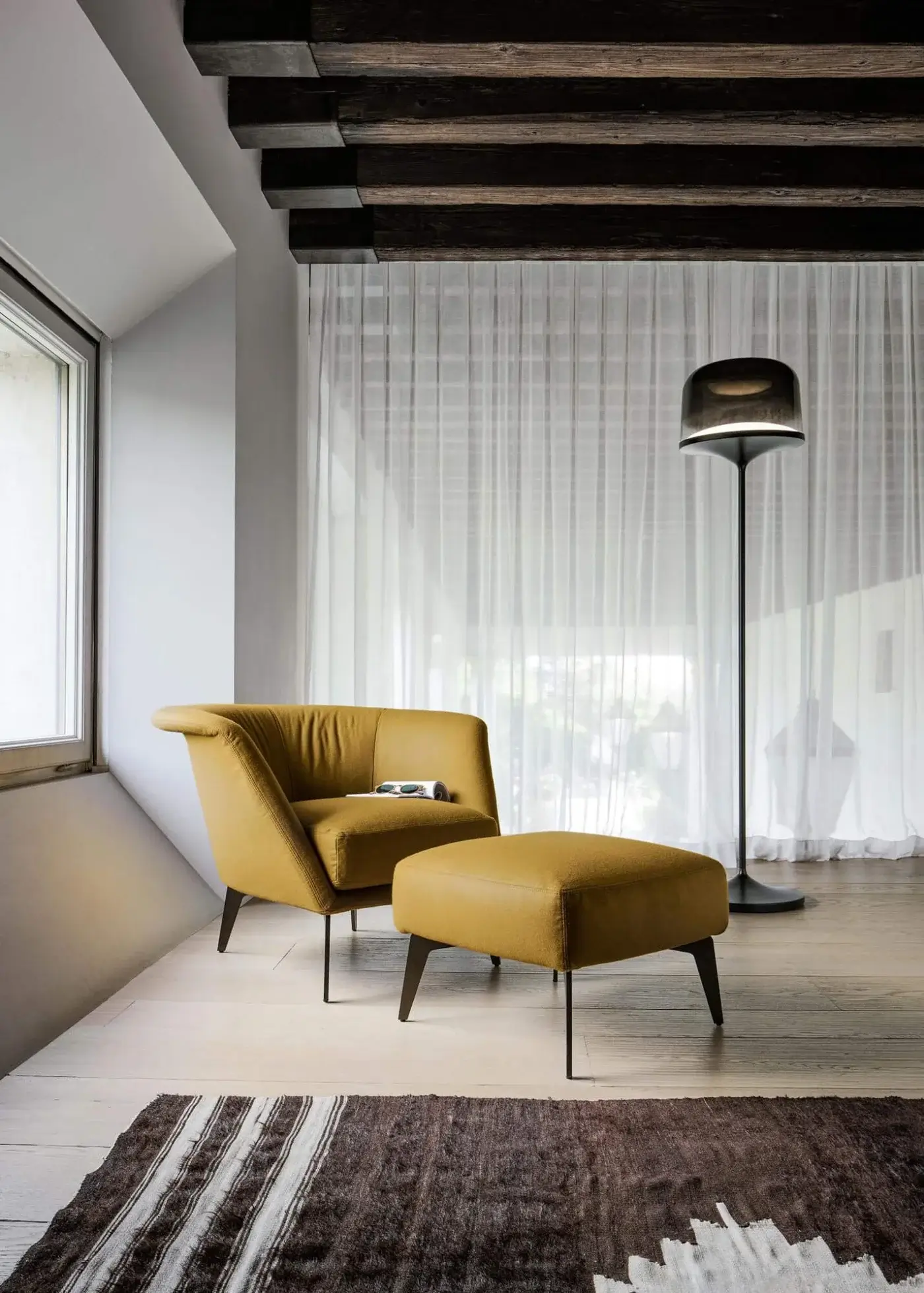 Exclusive Bonaldo Lovy lounge chair in mustard yellow removable fabric with matt painted metal feet and matching ottoman