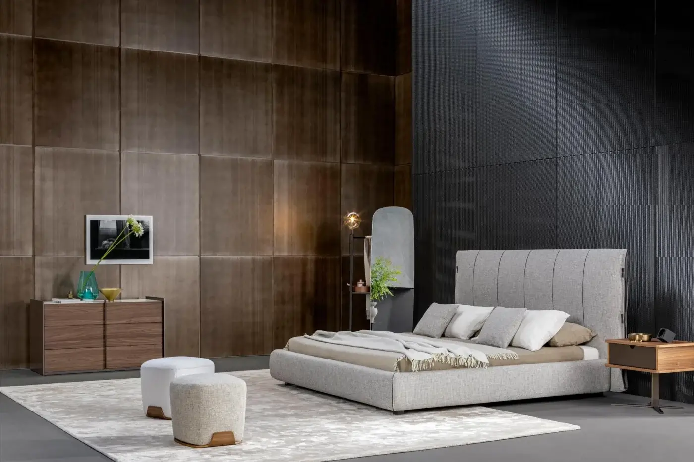 Distinguished Bonaldo Cuff bed with light gray textile upholstery and tailored frog fastenings on a platform frame