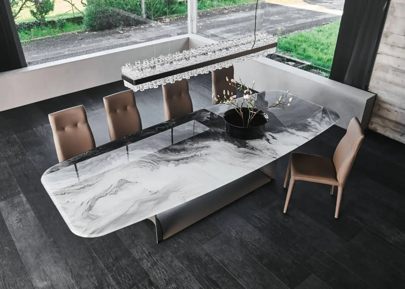 Distinguished Cattelan Italia Dragon table with black embossed steel and extra clear beveled glass exhibiting a marbled glossy finish