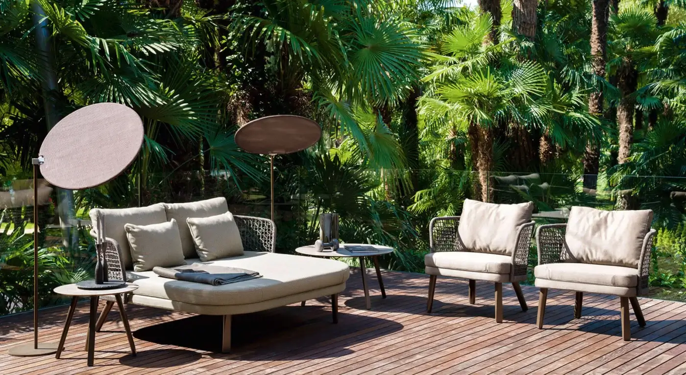 Exceptional Varaschin Emma lounge chair with light beige textile cushions and dark bronze metal frame