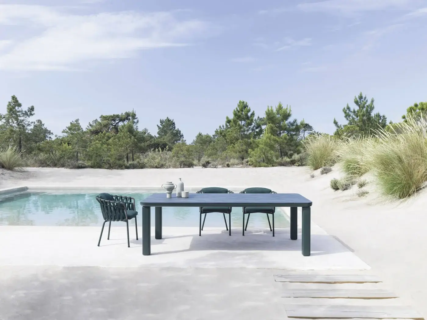 Exclusive Varaschin Customade table with muted blue-green aluminum structure and matte ceramic or HPL top