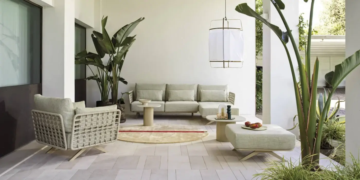 Superior Roberti Rattan Armàn sofa crafted in Italy with woven detailing and powder-coated stainless steel aluminum frame