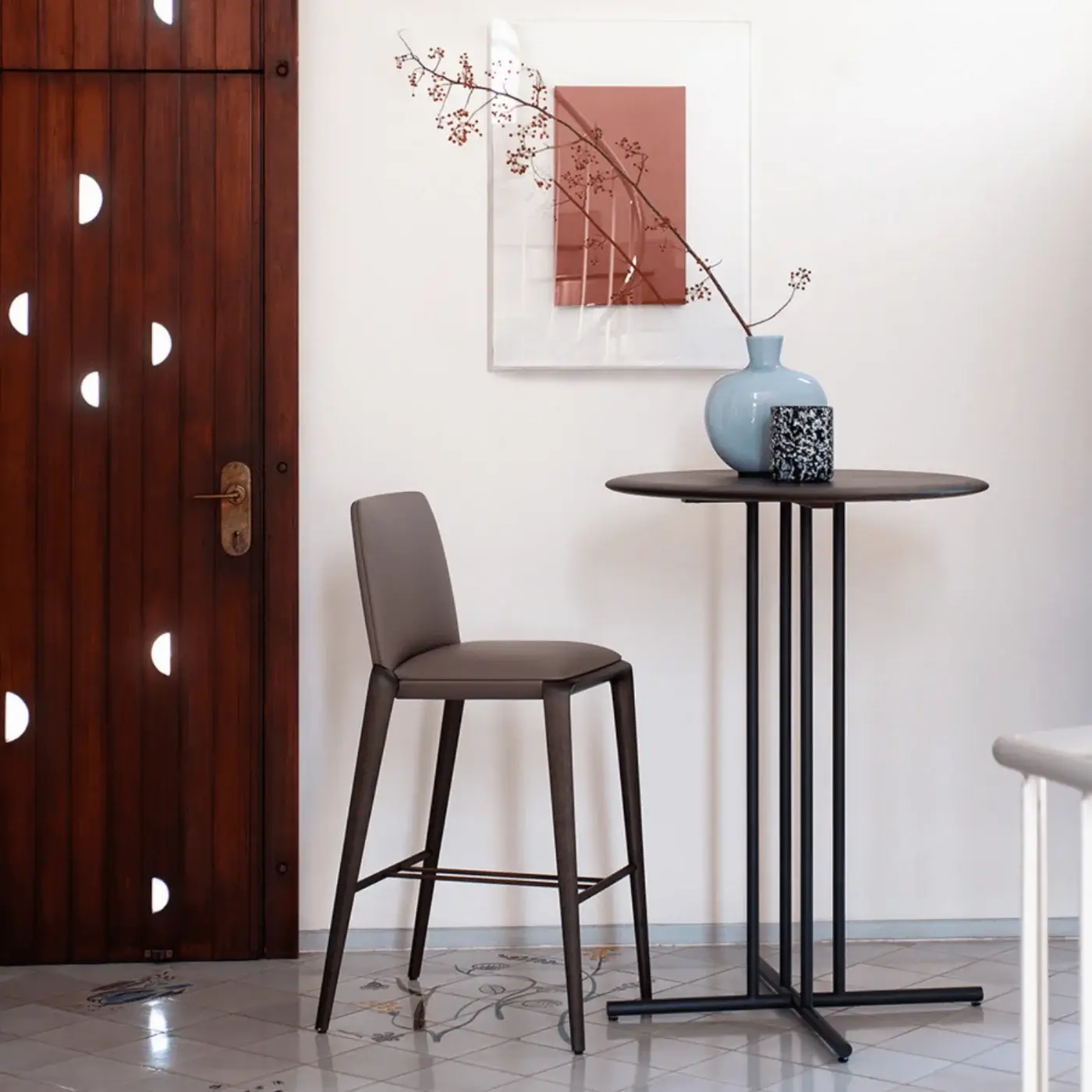 Distinguished Potocco Hiru stool in medium-brown wood with helical legs and meticulously upholstered leather or fabric seat with matte finish