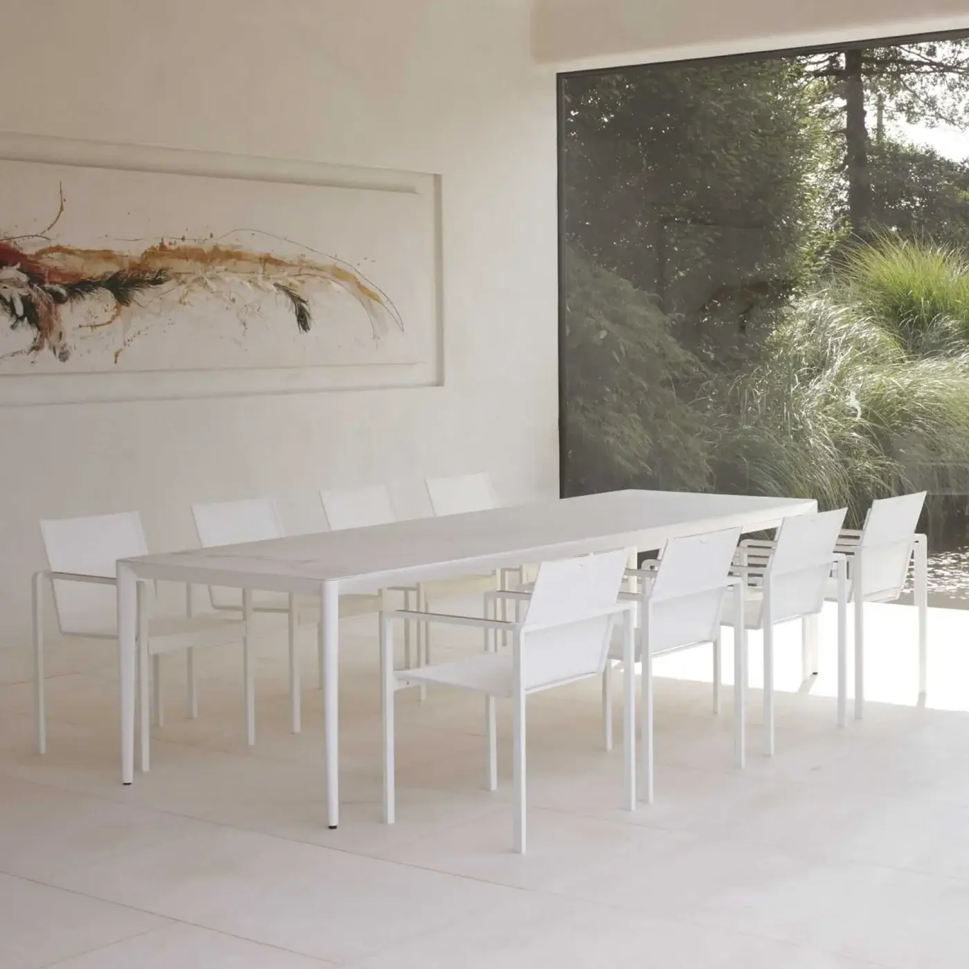 Distinguished Royal Botania Alura armchair crafted with lightweight aluminum, white textured finish and breathable mesh seat