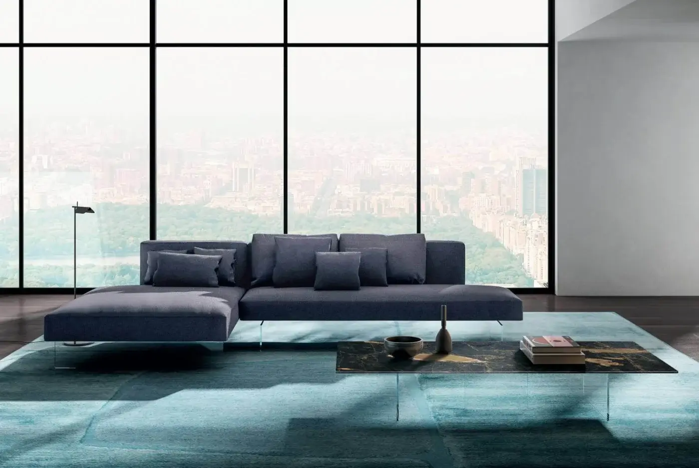 Captivating Lago Air coffee table with dark stone-like composite top displaying gold veining and transparent tempered glass legs