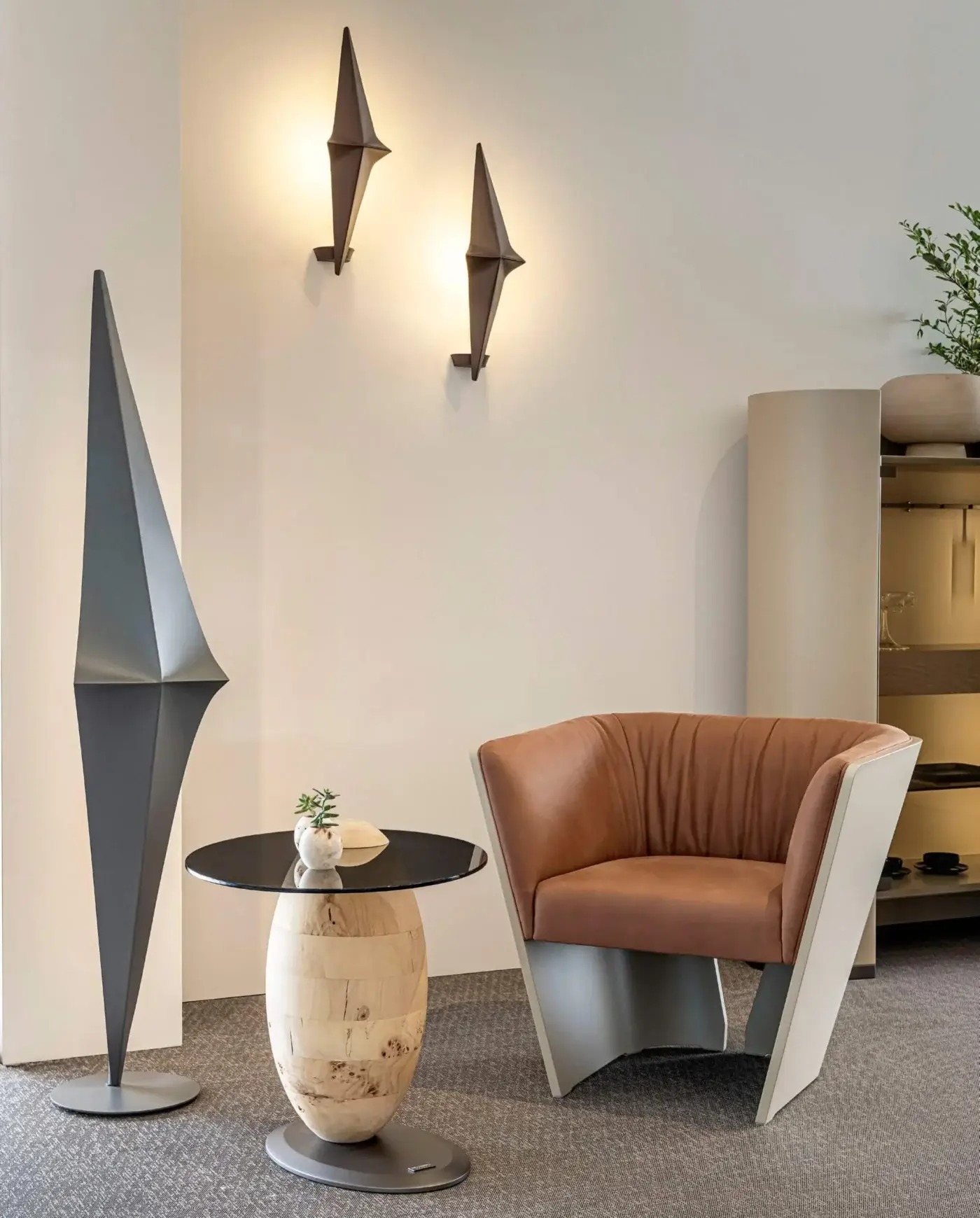 Distinguished Bizzotto Italia Pluff side table crafted with burl wood segments and a sleek black glass top with matte finish
